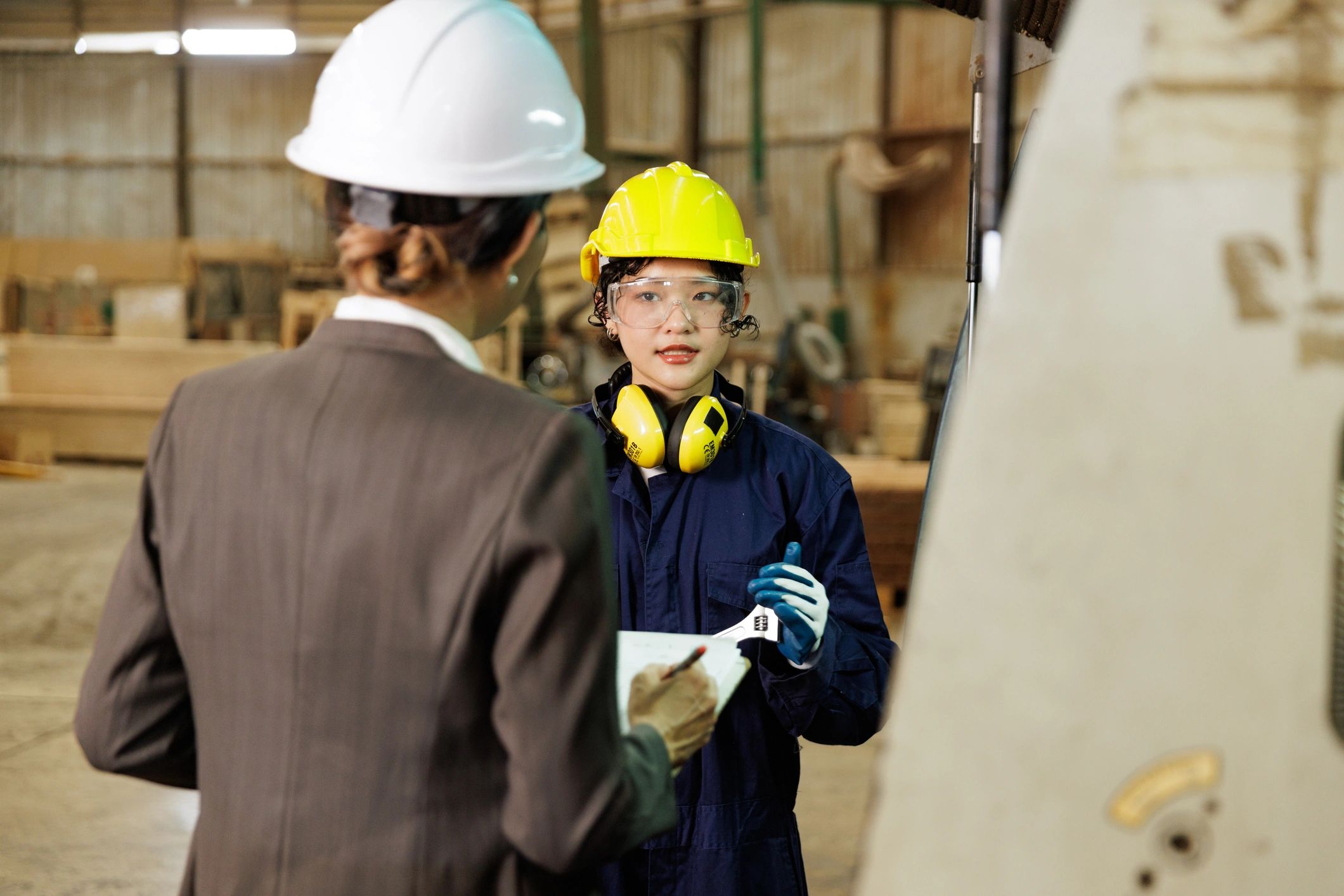 Engineers collaborating on custom part design